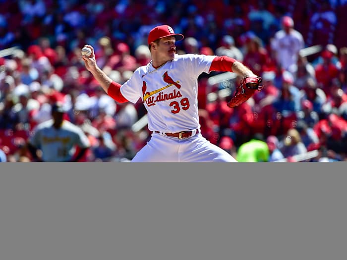 Apr 9, 2022; St. Louis, Missouri, USA;  St. Louis Cardinals starting pitcher Miles Mikolas (39) pitches against the Pittsburgh Pirates during the first inning at Busch Stadium.